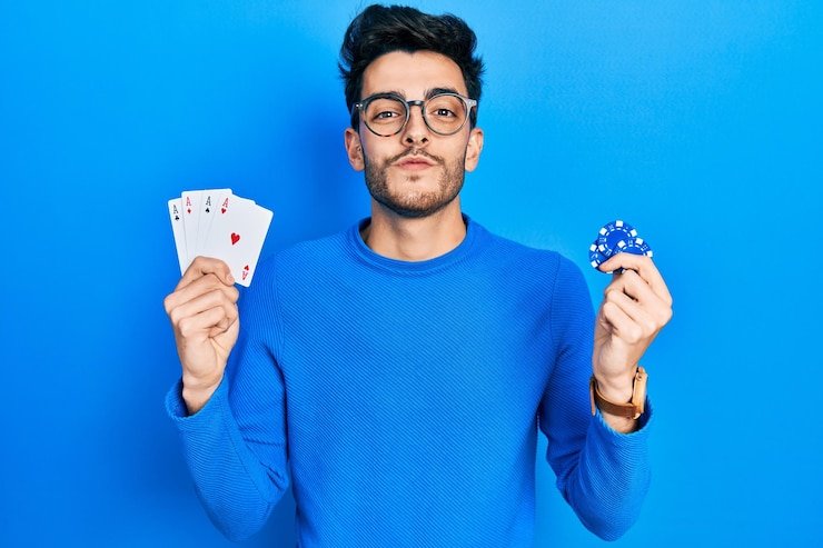 Seseorang merenungkan kebiasaan bermain online sebagai bagian dari evaluasi diri responsible gaming